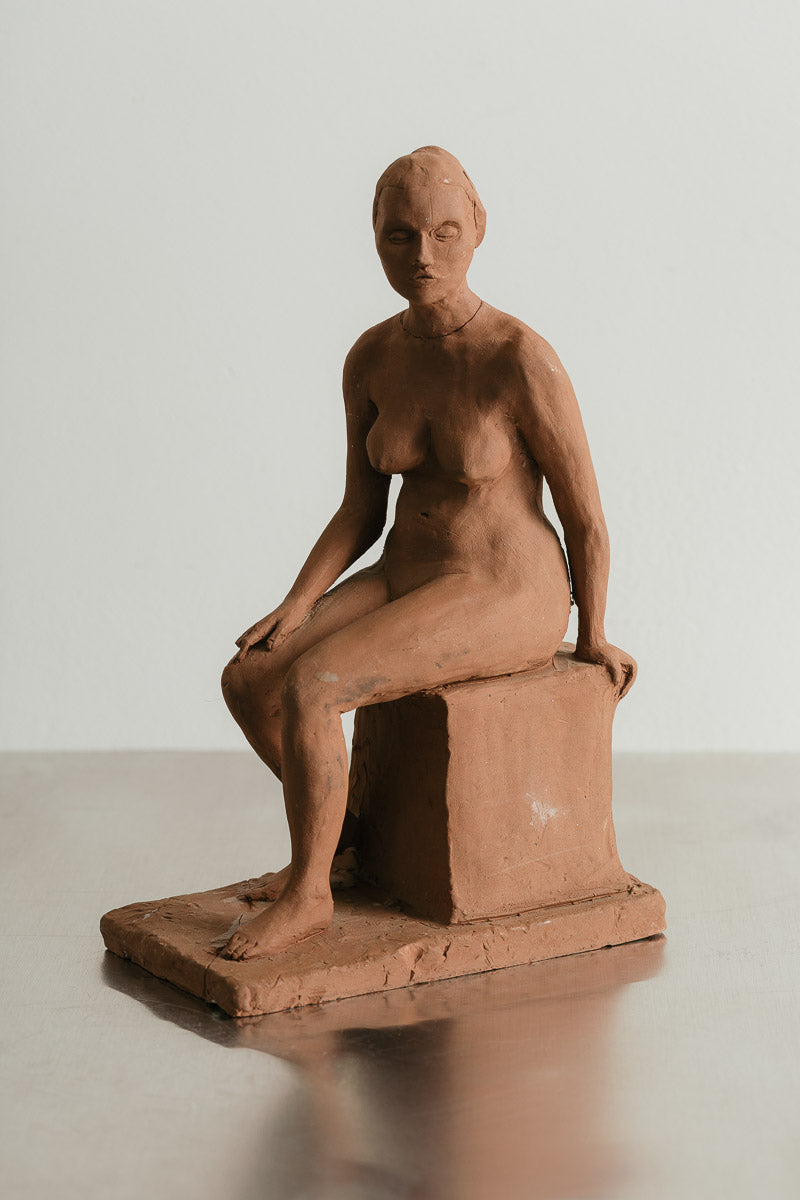 Seated Woman Sculpture