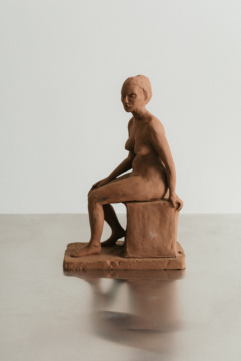 Seated Woman Sculpture