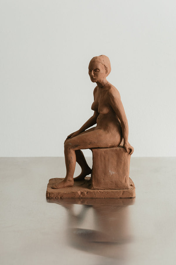 Seated Woman Sculpture