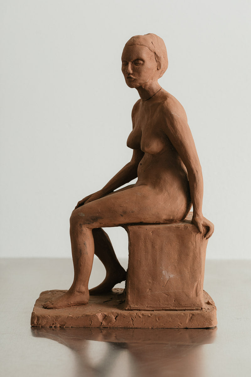 Seated Woman Sculpture