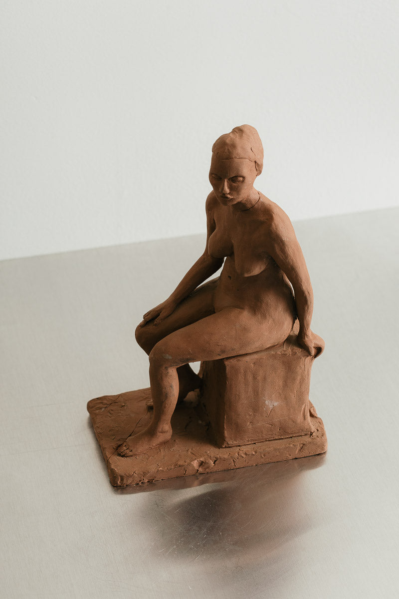 Seated Woman Sculpture