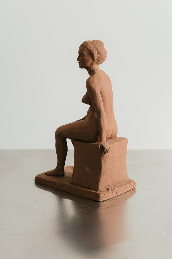 Seated Woman Sculpture