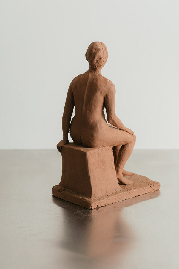 Seated Woman Sculpture