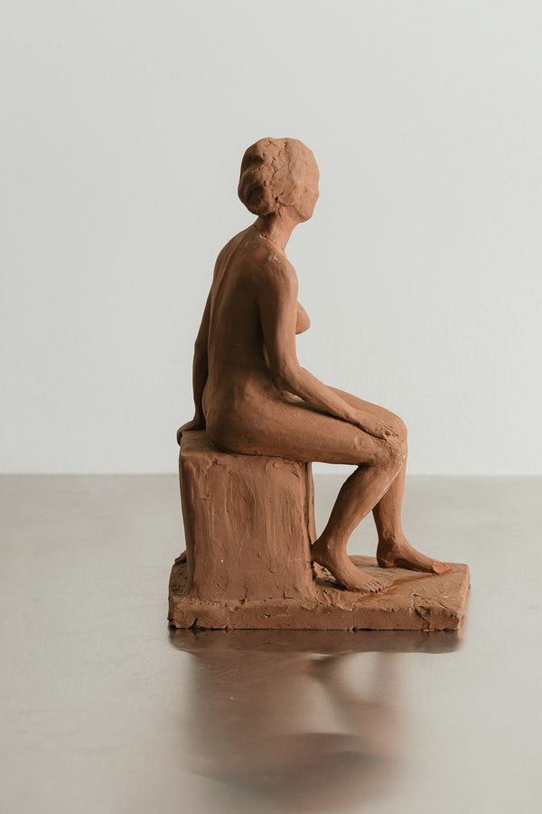 Seated Woman Sculpture