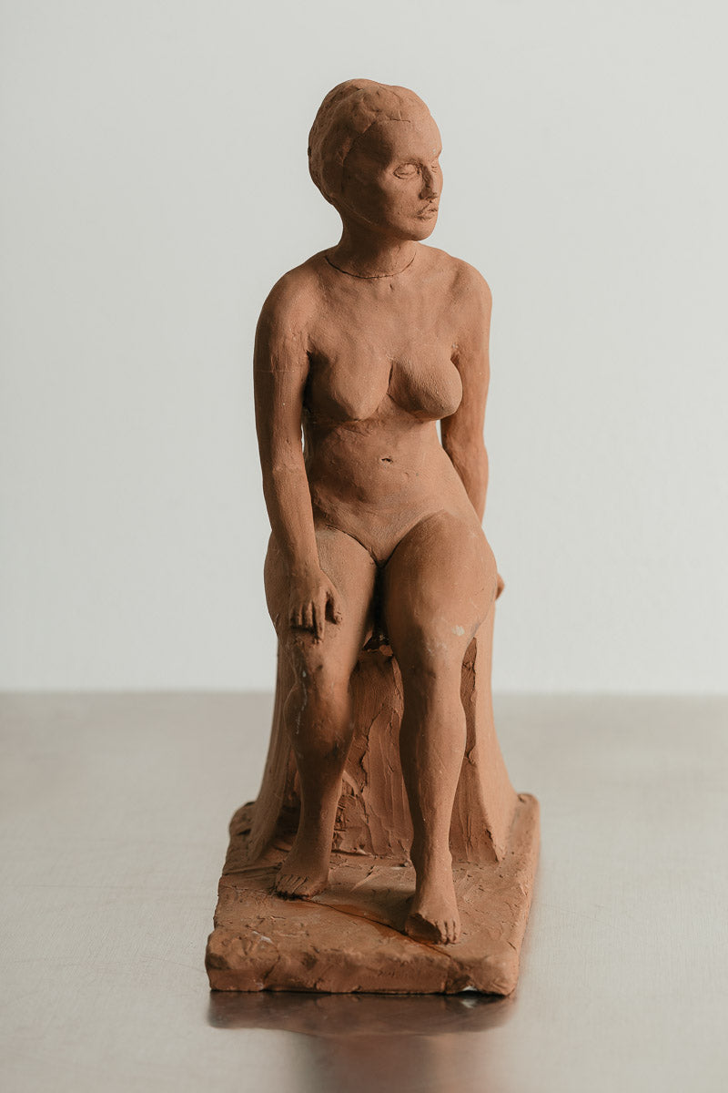 Seated Woman Sculpture